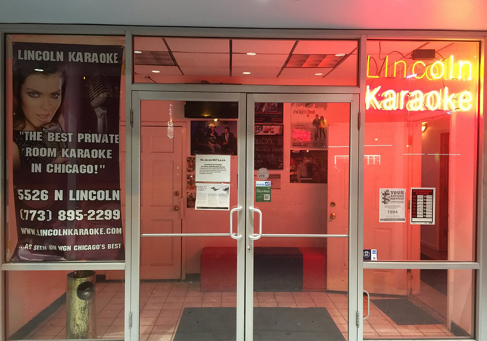 Lincoln Karaoke storefront entrance at night, 5526 N Lincoln
